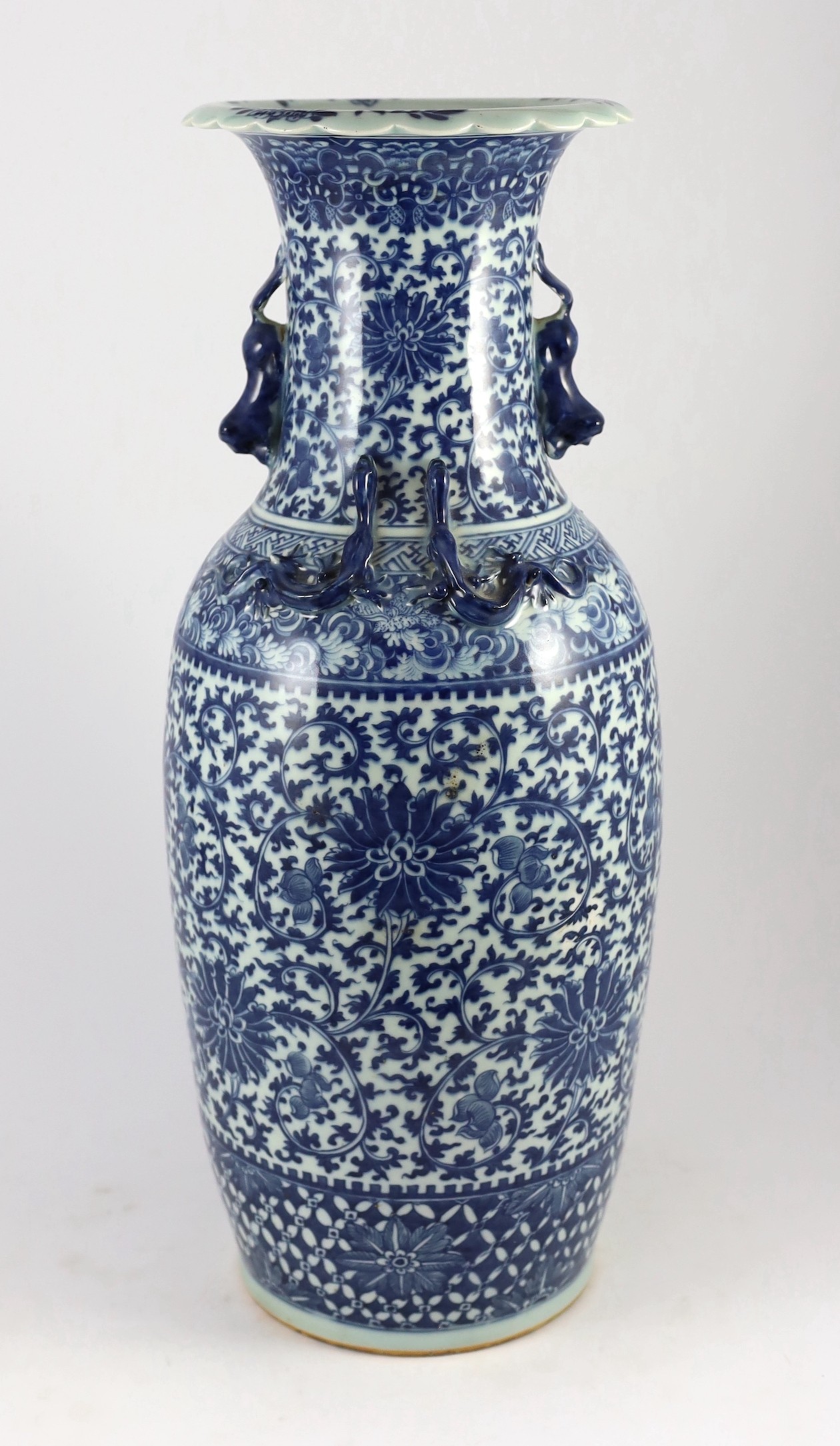 A large Chinese blue and white ‘lotus’ vase, 19th century, 59cm high, damaged